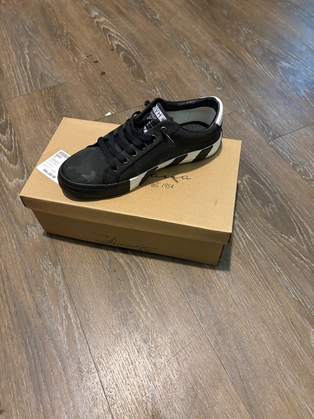 Vintage Black Low-Top Sneakers with White Stripe Detail